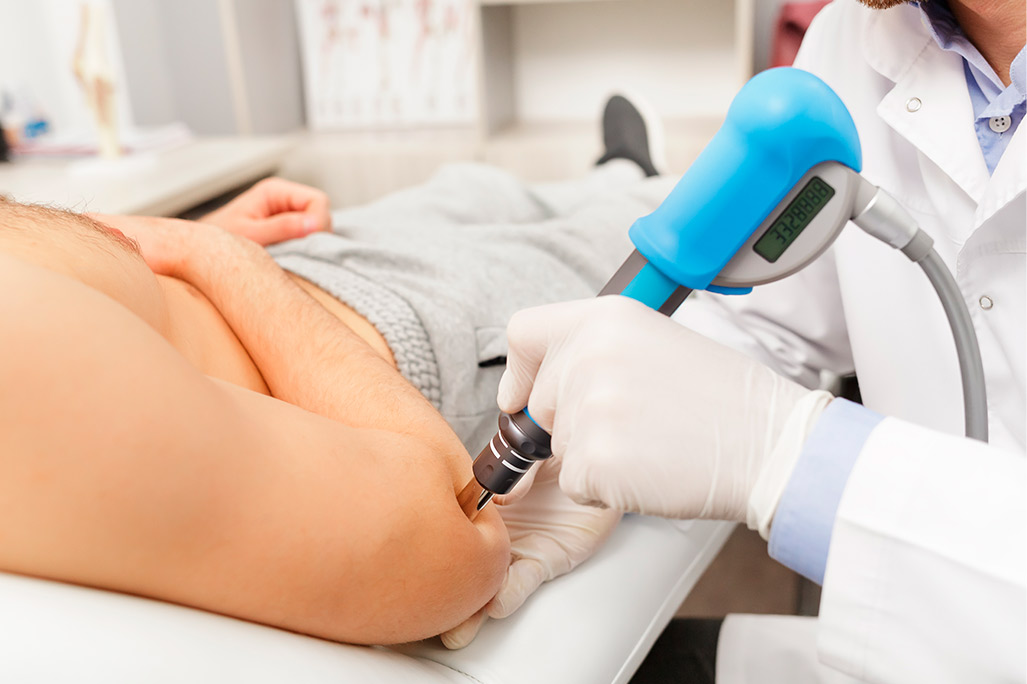 Focused shockwave therapy over elbow